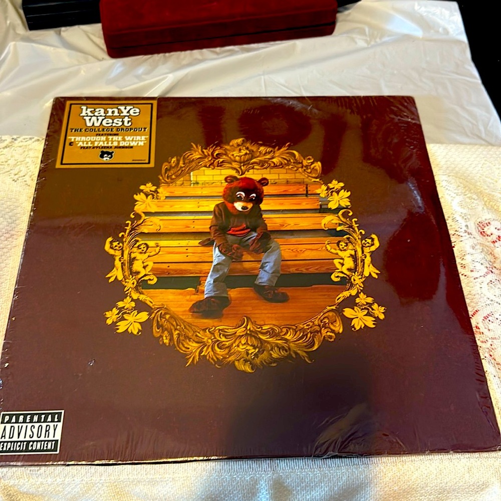 Kanye west the college dropout featuring “through the wire “”all fall down”